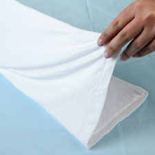 Fold shirt in half lengthwise. Fold shirt in half lengthwise.