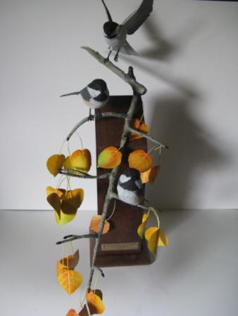 Black-Capped Chickadees on a Spen Branch Black-Capped Chickadees on a Spen Branch
