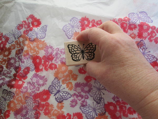 Stamp a random overlapping pattern on the tissue. Dry several hours. Stamp a random overlapping pattern on the tissue. Dry several hours.