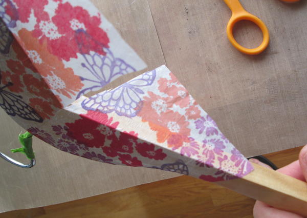 Cut out shapes, including smaller sections to fit on the curved areas. Cut out shapes, including smaller sections to fit on the curved areas.