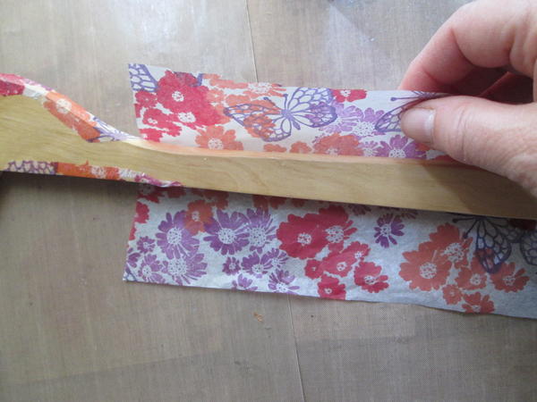 Matching pattern and overlapping edges slightly, position and attach, wrapping carefully around hanger edge and around the metal hanger area. Matching pattern and overlapping edges slightly, position and attach, wrapping carefully around hanger edge and around the metal hanger area.