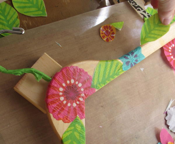 Repeat steps 4 through 6 with additional flower and leaf images, overlapping as desired wrapping carefully around hanger edges and around the metal hanger area. Dry completely. Repeat steps 4 through 6 with additional flower and leaf images, overlapping as desired wrapping carefully around hanger edges and around the metal hanger area. Dry completely.