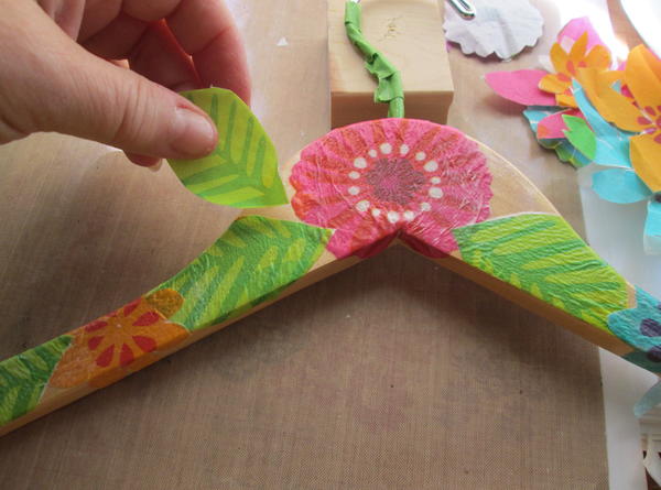 Repeat steps 4 through 6 with additional flower and leaf images, overlapping as desired wrapping carefully around hanger edges and around the metal hanger area. Dry completely. Repeat steps 4 through 6 with additional flower and leaf images, overlapping as desired wrapping carefully around hanger edges and around the metal hanger area. Dry completely.