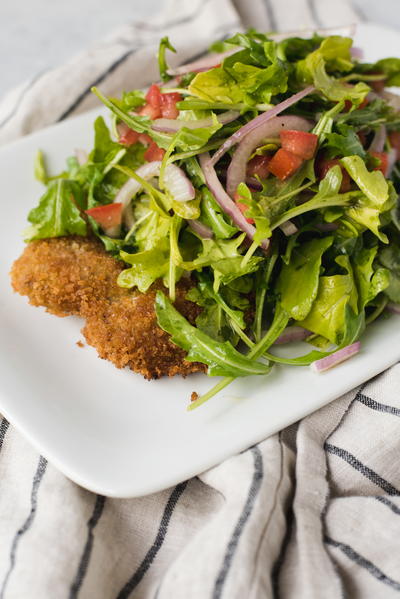 Veal Milanese with Arugula Tomato and Red Onion Salad Veal Milanese with Arugula Tomato and Red Onion Salad