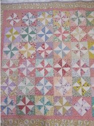 Cheery Vintage Pinwheel Quilt | AllFreeSewing.com