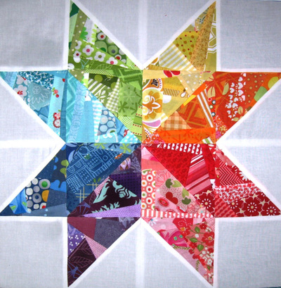 Scrappy Rainbow Star Quilt Block | FaveQuilts.com