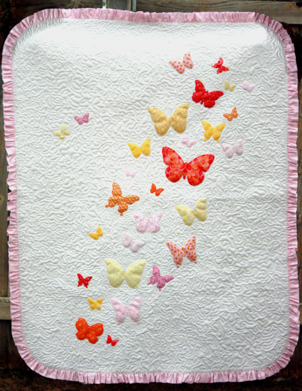 Butterflies A Flutter Baby Quilt Pattern FaveQuilts butterflies-a-flutter-baby-quilt-pattern-favequilts