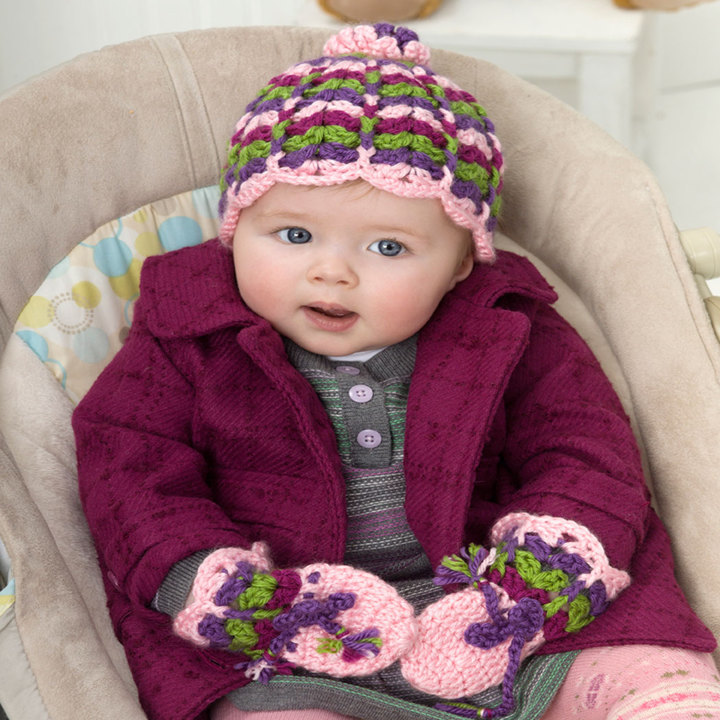 white baby hat and mittens