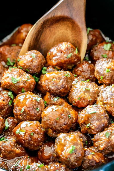 Sweet and Spicy Slow Cooker Meatballs | AllFreeSlowCookerRecipes.com