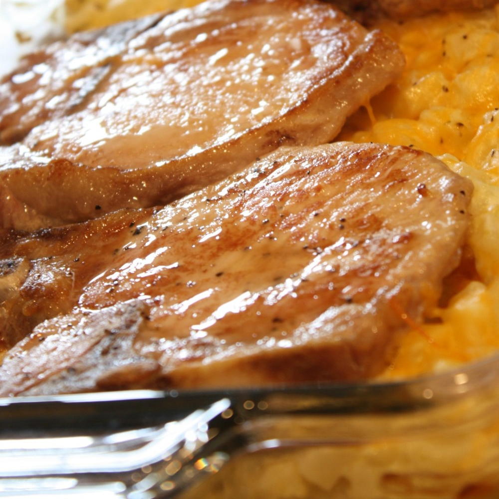 Smothered Hash Brown And Pork Chop Casserole | AllFreeCasseroleRecipes.com